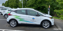 Municiple electric fleet vehicle plugged into ChargePoint charger