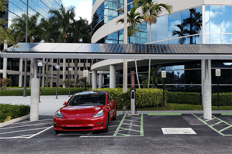 Tesla Model 3 in EV parking spot