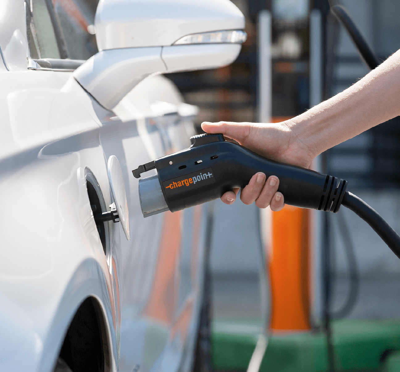 Person charging a car