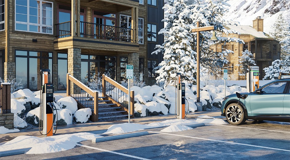 ChargePoint AC and DC stations in front of a lodge covered in snow
