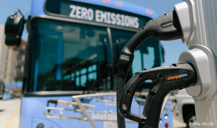 Close up of charger with transit bus in background