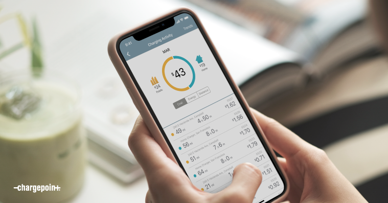 Person holding a mobile phone and viewing ChargePoint app