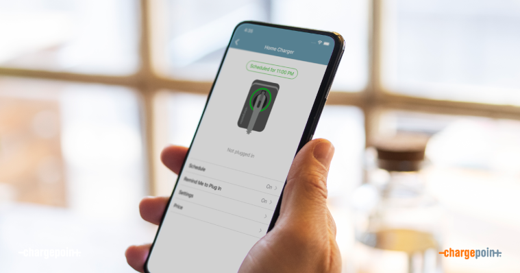 Person holding mobile phone with ChargePoint app on it