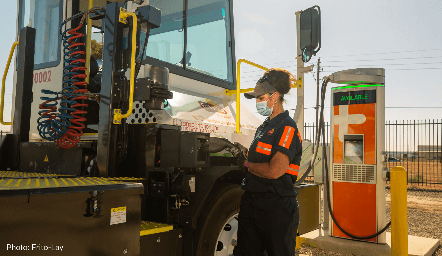 Person charging PepsiCo yard tractor