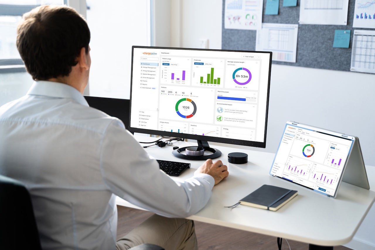 Person in front of a computer using ChargePoint Platform