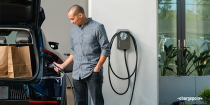 Person charging their car using ChargePoint Home Flex