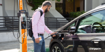Person charging their car using ChargePoint CT4000