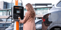 Person using ChargePoint tap-charge
