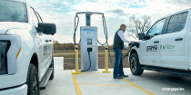 Person charging a truck using ChargePoint Express Plus