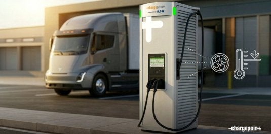 Electric truck beside a fast-charging station outside a modern facility, with icons indicating cooling technology.