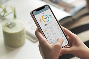 Person hand holding phone with ChargePoint app