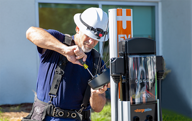 Image of man installing ChargePoint Station