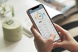 Person hand holding phone with ChargePoint app