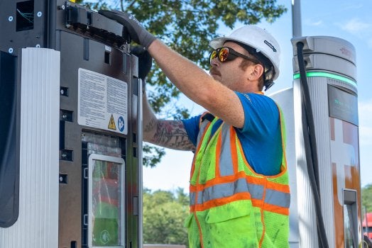 Person installing ChargePoint Express