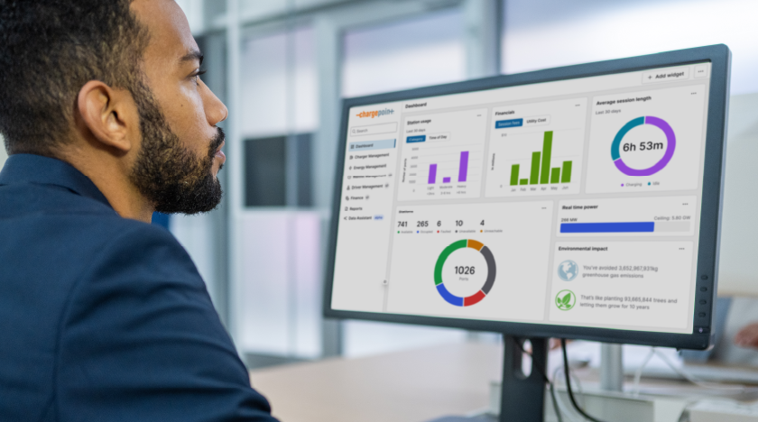 Person in front of a computer using ChargePoint CMS 