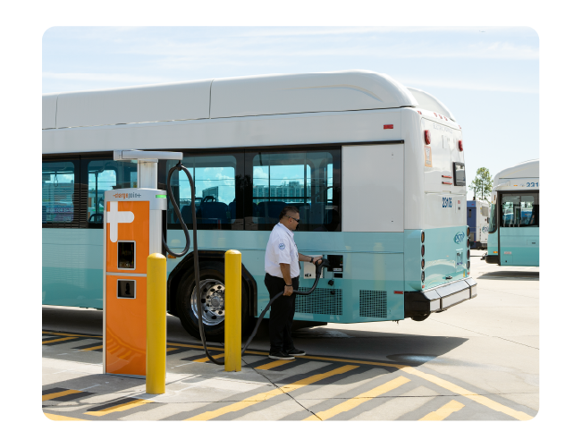 Person charging their EV bus using ChargePoint CPE280