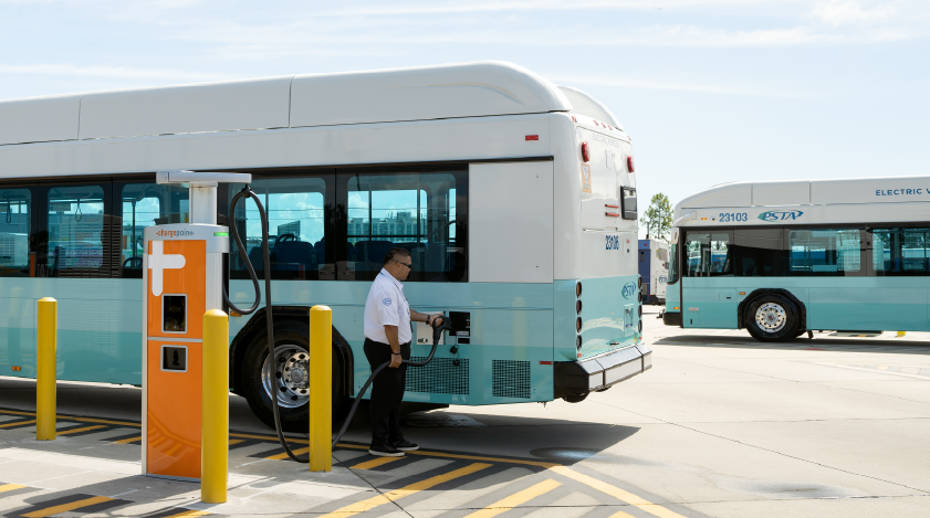 Person charging their bus using ChargePoint station