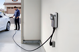 Person charging their car using ChargePoint Home Flex
