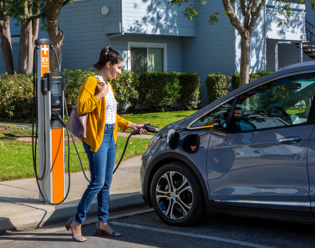 Person charging their car on ChargePoint CP6000