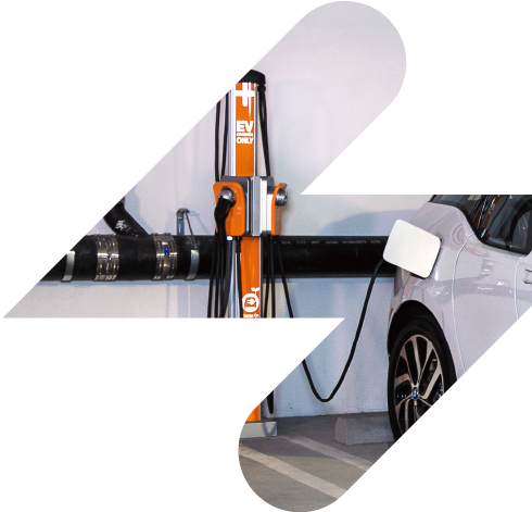 EV plugged into apartment charging station EV plugged into apartment charging station