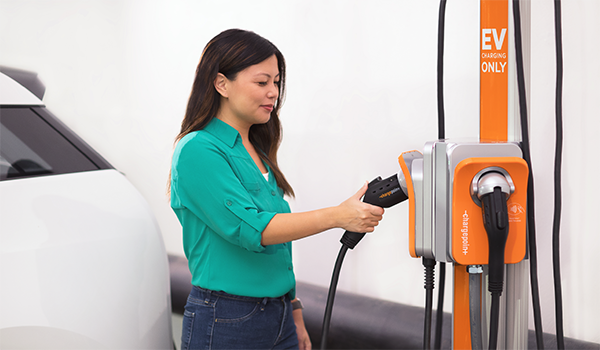 Person using CPH50 charger Person using CPH50 charger