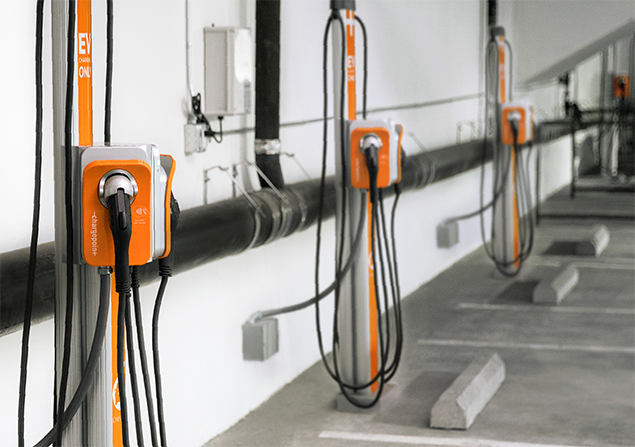EV charging stations in a parking garage EV charging stations in a parking garage